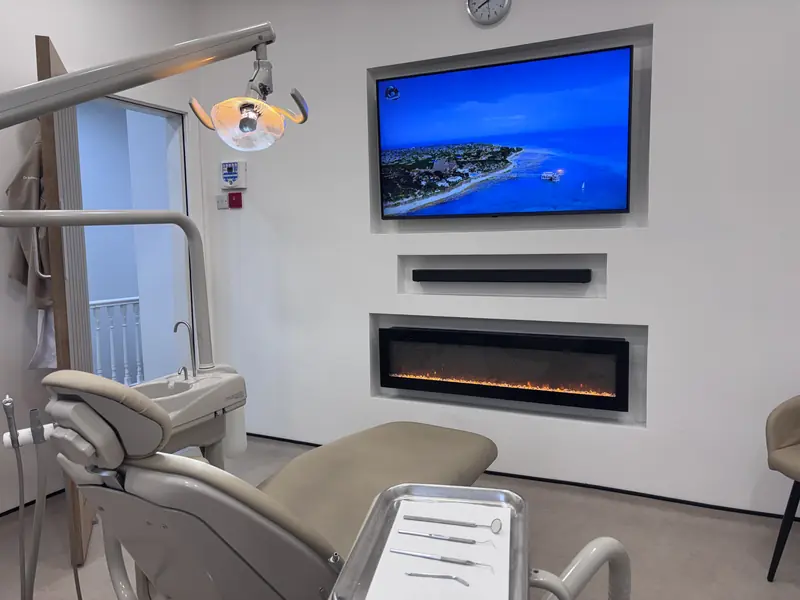 A second treatment room at Deepcar Dental Care with electric fireplace